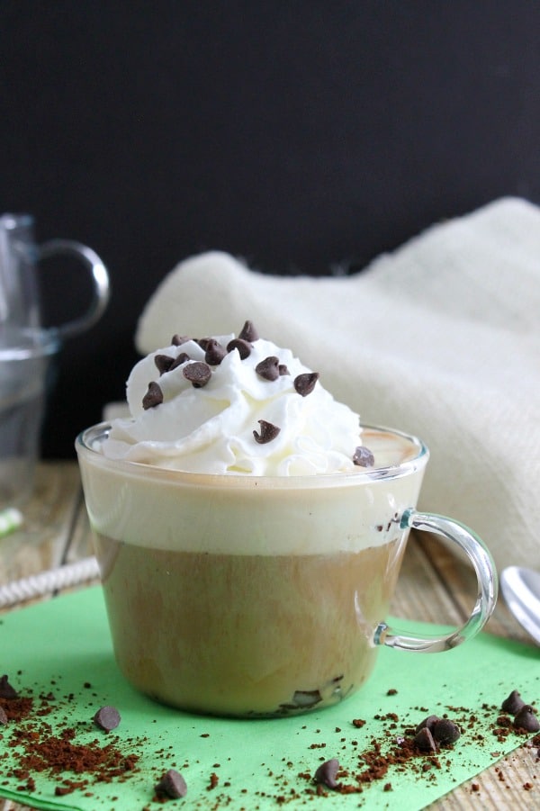 Mint Chocolate Chip Affogato is a coffee drink that can be enjoyed all year round. Adding my own twist to this delicious Italian coffee with mint ice cream! Mint Chocolate Chip Affogato on green background