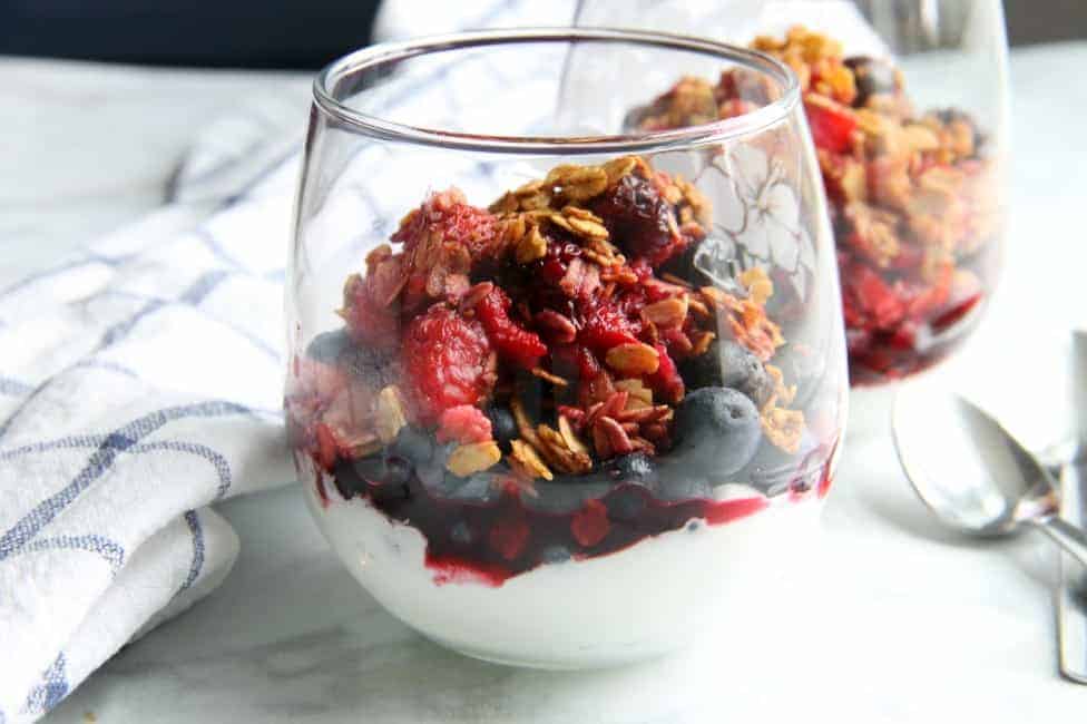 An easy baked dessert with a delicious crunchy topping! This Mixed Berry Crisp is a great way to use up those summer berries! Mixed Berry Crisp in glass cup