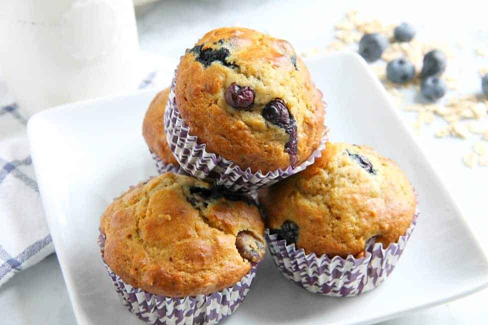 Blueberry Oatmeal Muffins are the prefect way to start your day! With a few simple ingredients and fresh berries these are super easy to make! | The Bitter Side of Sweet #muffins #blueberries #backtoschool Blueberry Oatmeal Muffins
