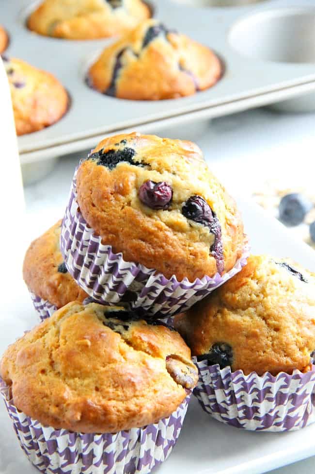 Blueberry Oatmeal Muffins are the prefect way to start your day! With a few simple ingredients and fresh berries these are super easy to make! | The Bitter Side of Sweet #muffins #blueberries #backtoschool Blueberry Oatmeal Muffins