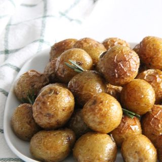 Spicy Roasted Rosemary Potatoes on white plate