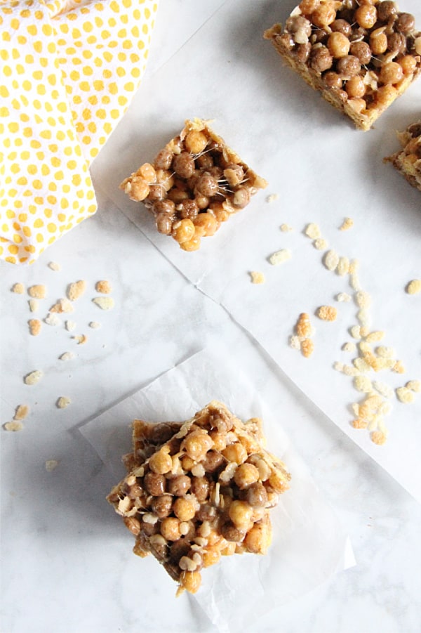 Chocolate Peanut Butter Marshmallow Treats are an ooey, gooey treat! With two different types of cereal and lots of marshmallows, these will not disappoint! Chocolate Peanut Butter Marshmallow Treats with cereal