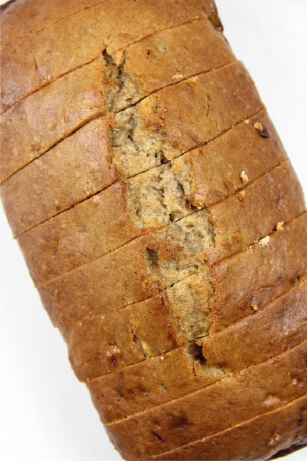 This Classic Banana Bread is so easy to make! With just 2 ripe bananas and a few other ingredients this will be ready in no time! Classic Banana Bread on white back ground