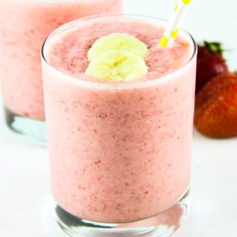 Strawberry Banana Smoothie in glass with straws