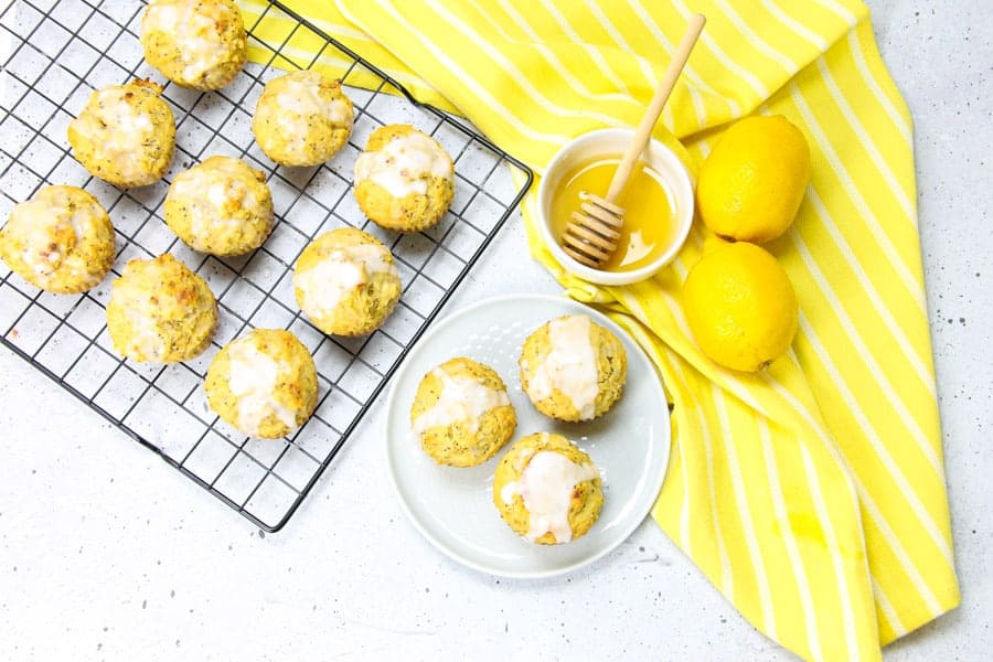 Easy Lemon Chia Muffins! Full of tangy, lemony flavor loaded with chia seeds for the perfect way to start the day! Packed with protein! Lemon Chia Muffins on white plate