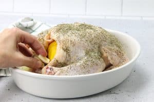 Oven Baked Whole Chicken stuffed with garlic cloves