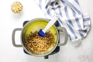 stirring in peanut butter chips