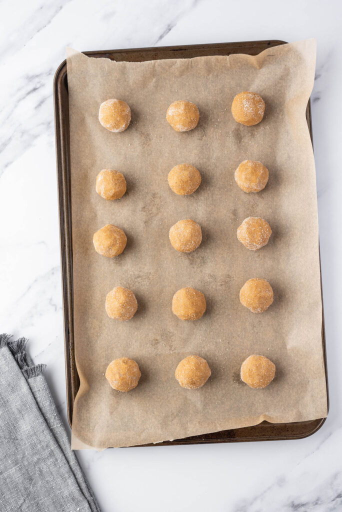 uncooked cookies on tray.