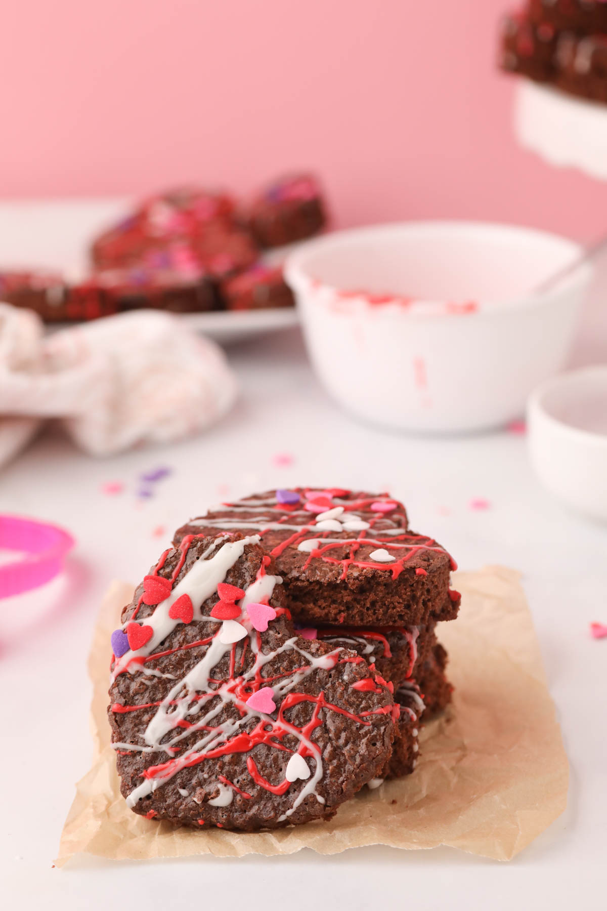 Valentines Day Brownies on parchment paper decorated.