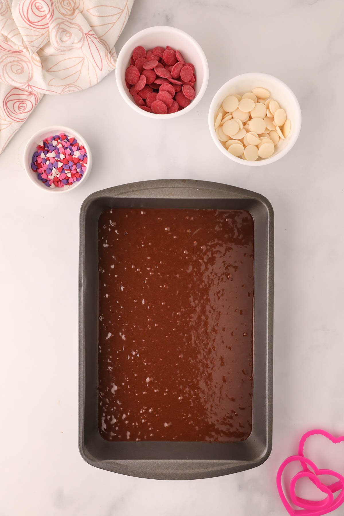 uncooked brownie mix in pan.