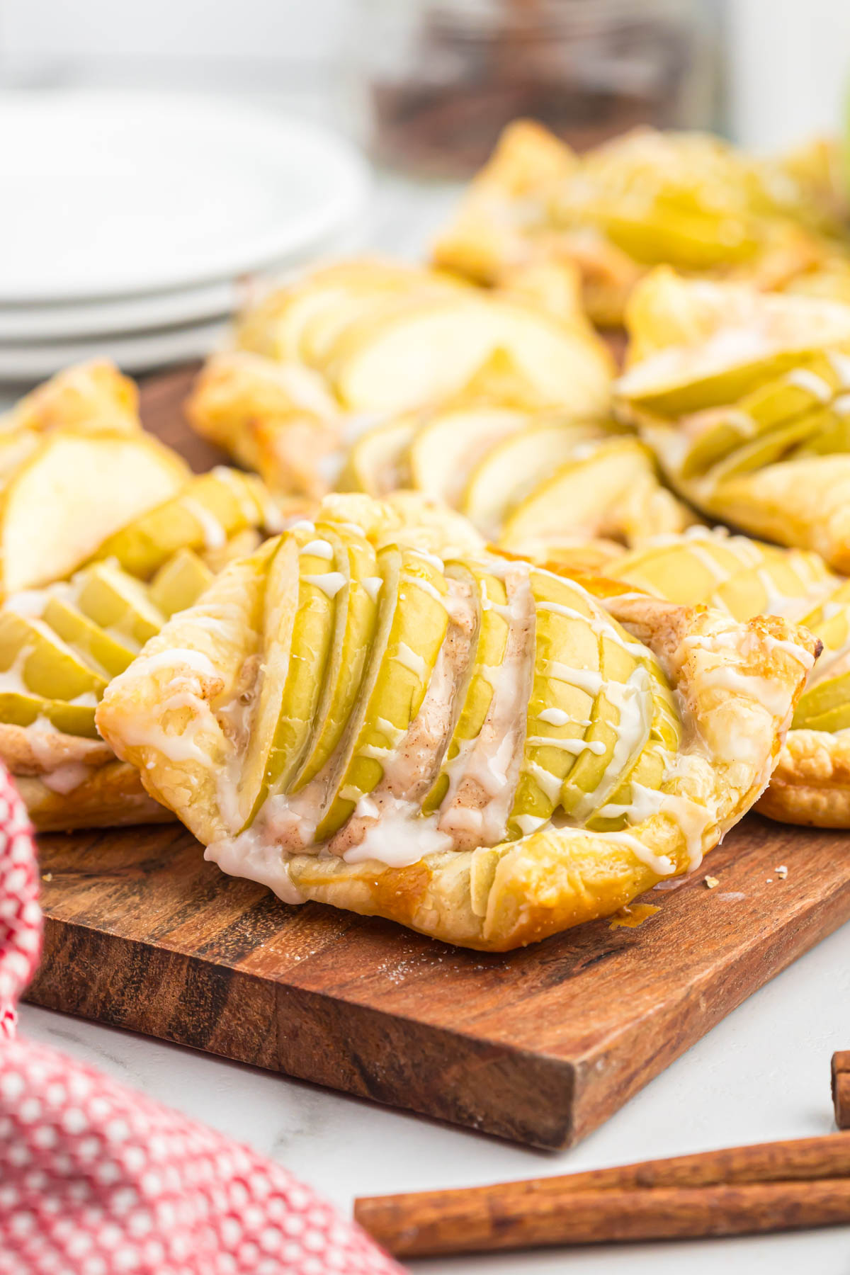 Apple Cinnamon Danish Pastry on wooden cutting board