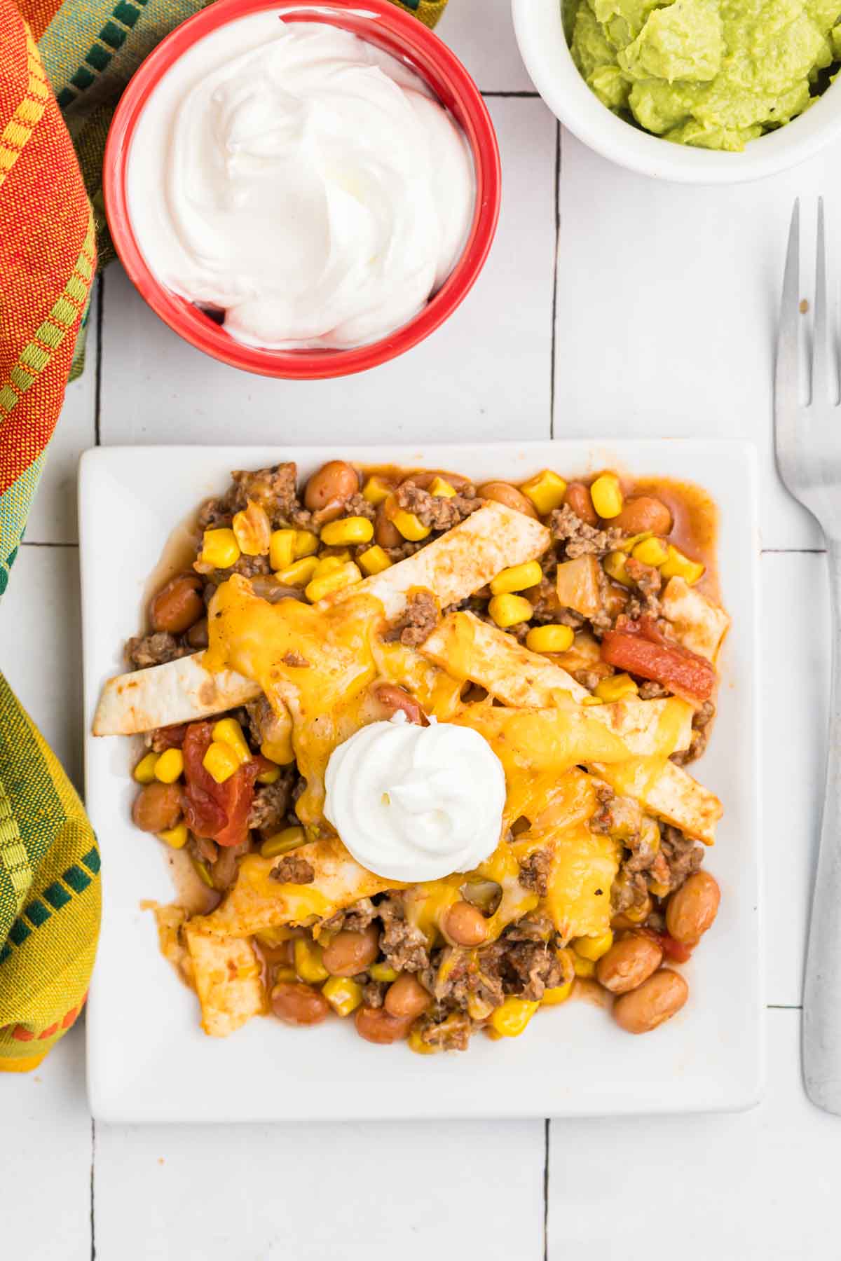 Easy taco skillet on white plate with fork.