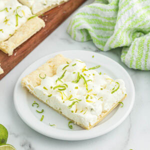 Key lime tarts on white plate.