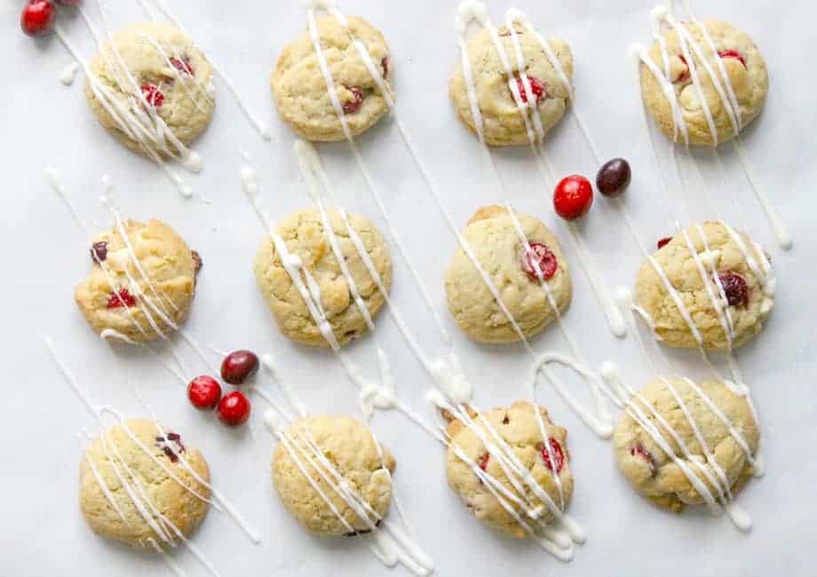 Cranberry White Chocolate Chip Cookies drizzled with white chocolate.