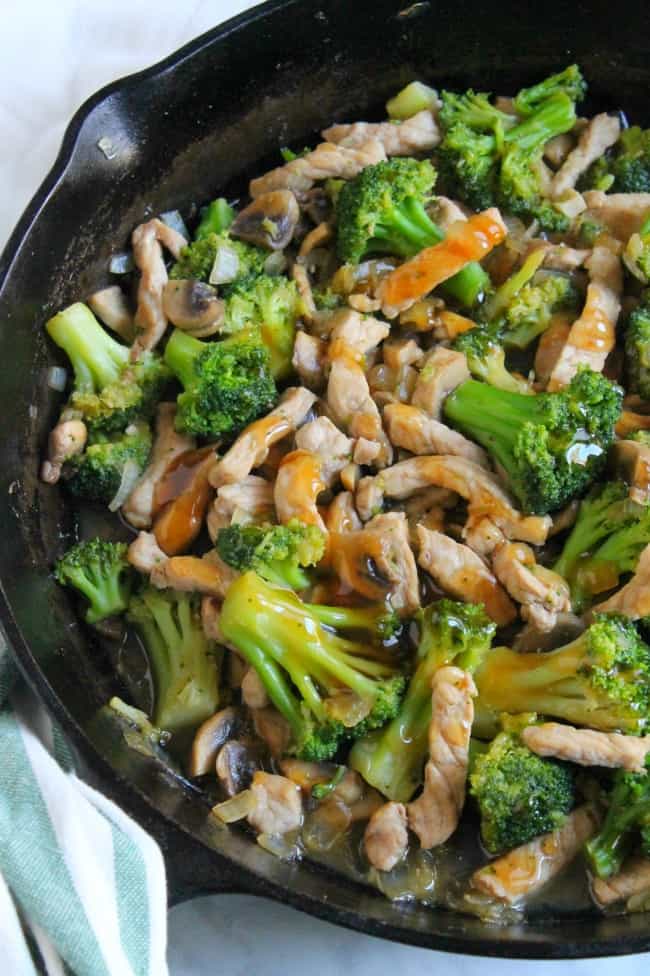 Broccoli Pork Stir Fry in black cast iron skillet