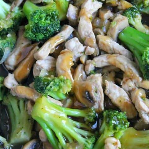 Broccoli Pork Stir Fry close up of broccoli, mushrooms and pork.