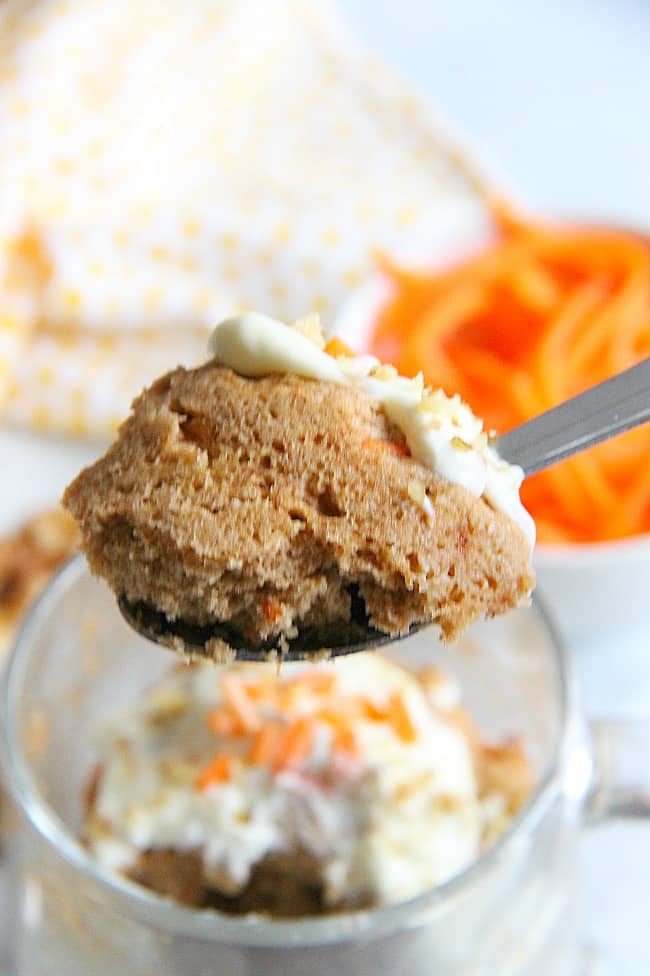 Carrot Cake Mug Cake with Cream Cheese Frosting is a homemade quick dessert that is made in about 3 minutes! Perfect for this time of year! Carrot Cake Mug Cake with Cream Cheese Frosting