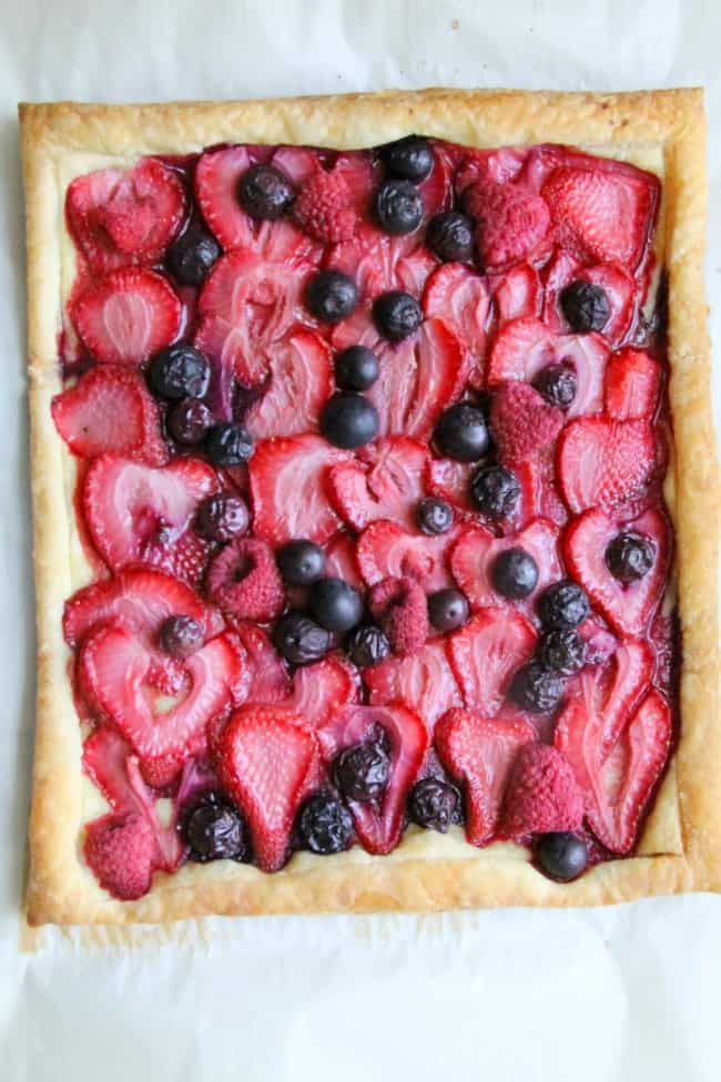 Mixed Berry Tart on parchment paper