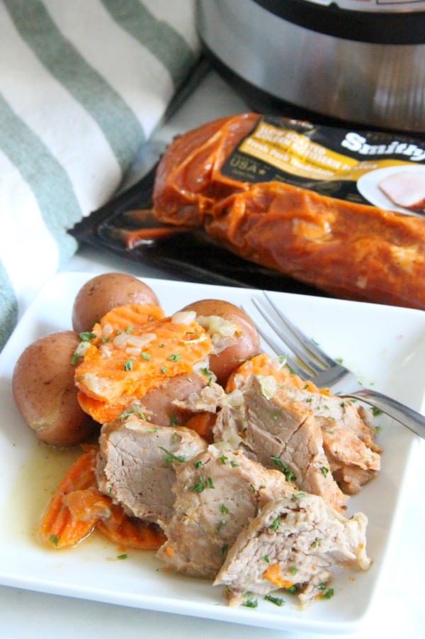 Instant Pot Pork with Potatoes and Carrots on white plate