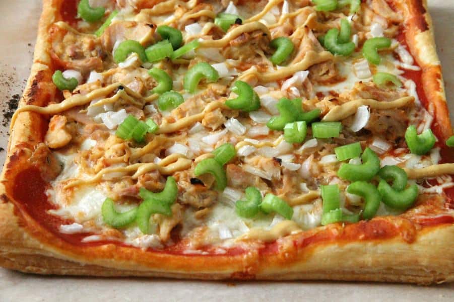 Puff Pastry Honey Mustard Chicken Pizza on parchment paper