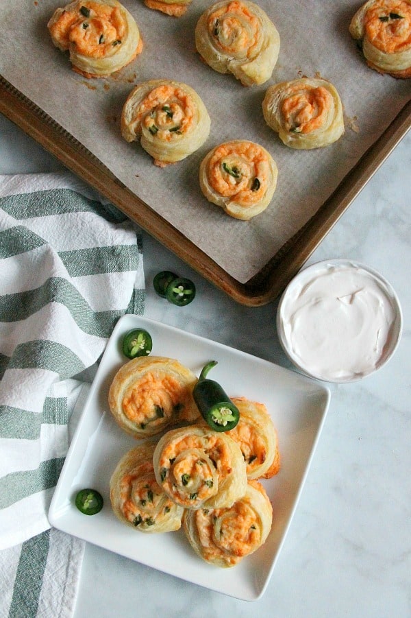 Puff Pastry Jalapeno Popper Pinwheels on white plate