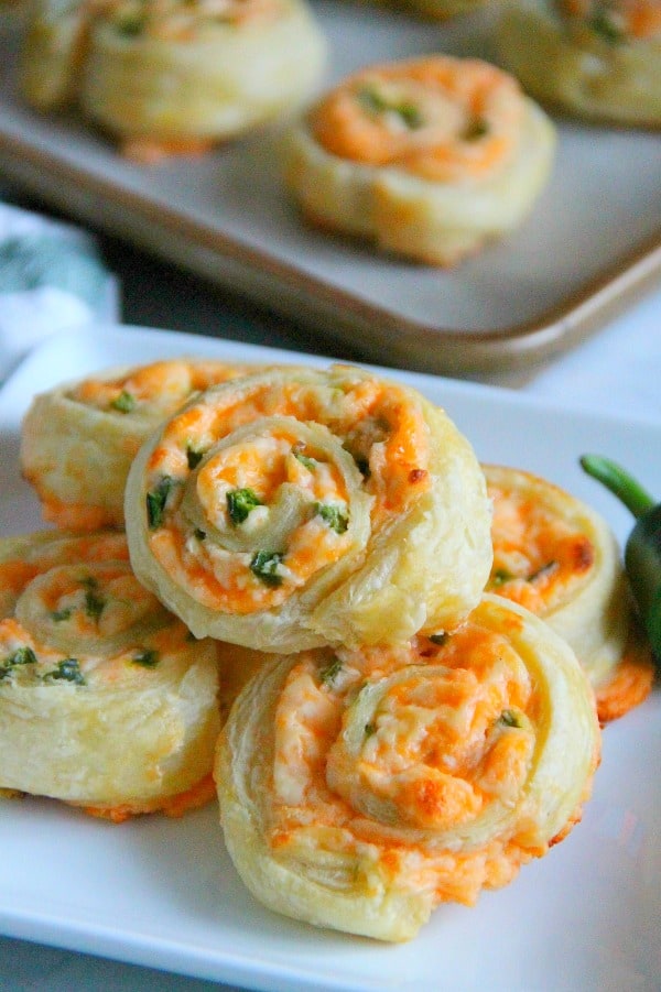 Puff Pastry Jalapeno Popper Pinwheels on white plate