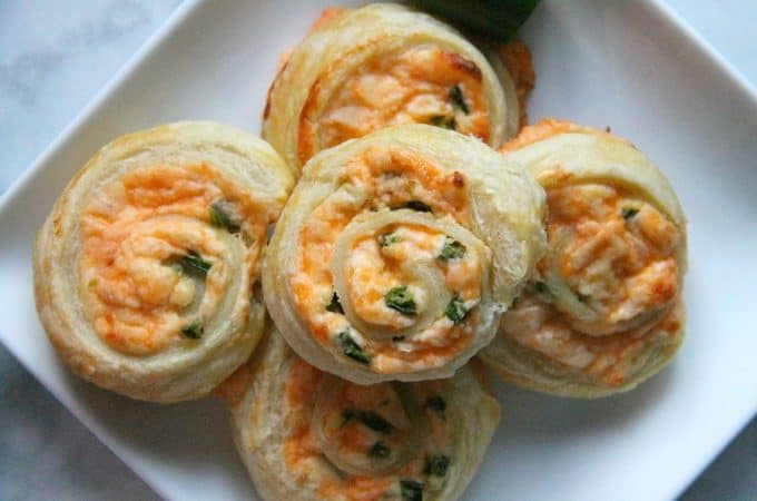 Puff Pastry Jalapeno Popper Pinwheels on white plate