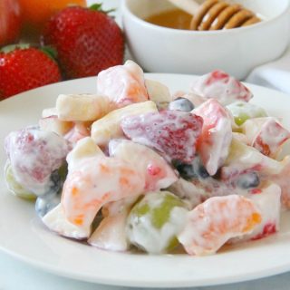 Creamy Yogurt Fruit Salad on white plate