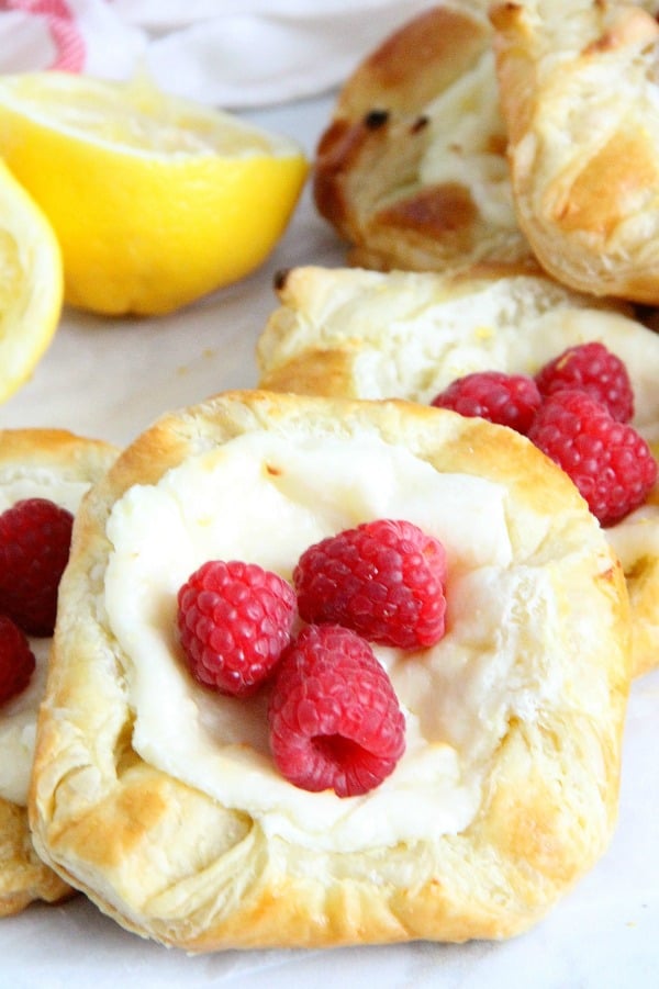 Lemon Raspberry Danish on parchment paper