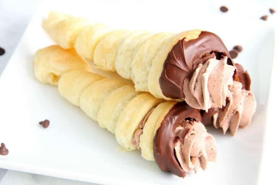 Chocolate Cream Horns on white plate