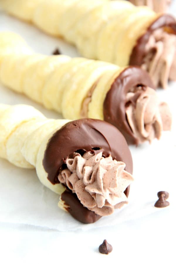 Chocolate Cream Horns on white plate