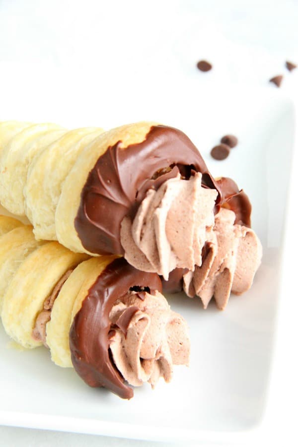 Chocolate Cream Horns on white plate