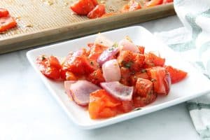 Sheet Pan Roasted Tomatoes on white plate
