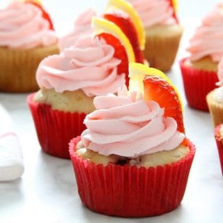 Strawberry Lemon Cupcakes with red cupcake liner on white background