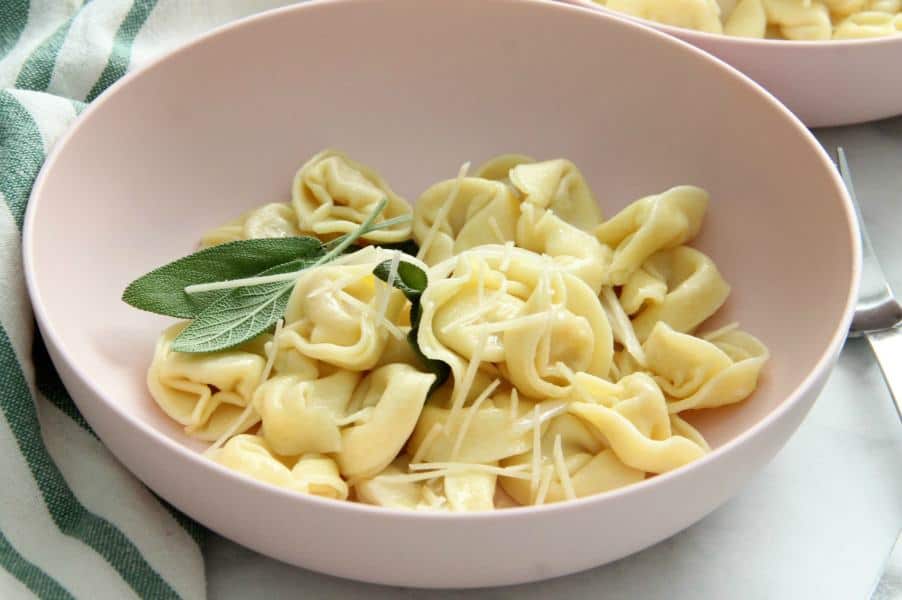 Tortellini with Butter and Sage in light pink bowl