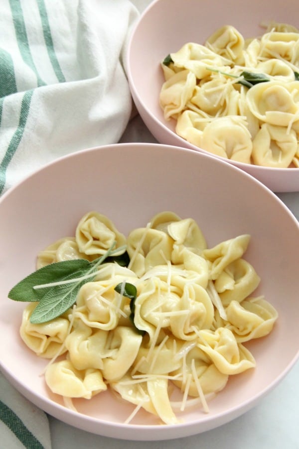 Tortellini with Butter and Sage in light pink bowl