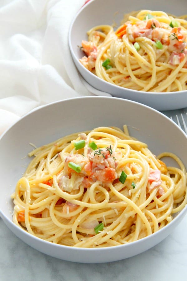 Bucatini with Tomatoes in grey bowl