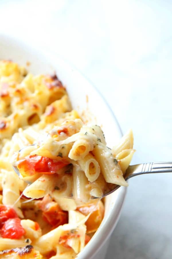 Cheesy Tomato Pasta Bake in white bowl