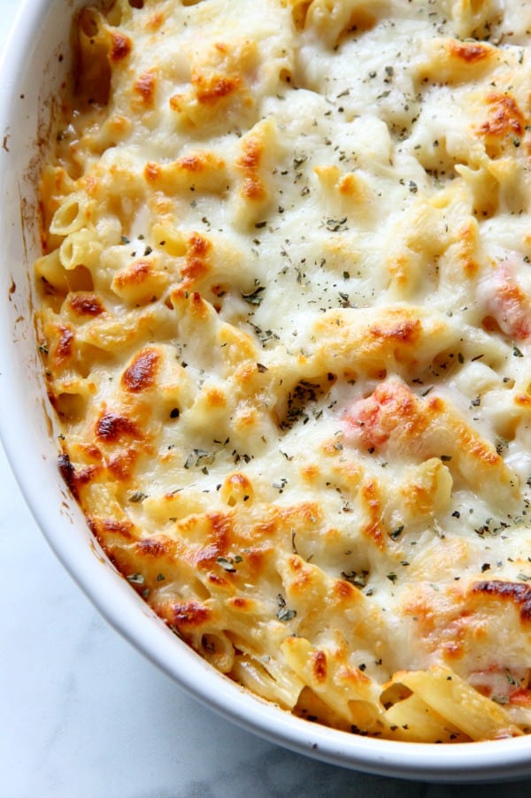 Cheesy Tomato Pasta Bake in white bowl