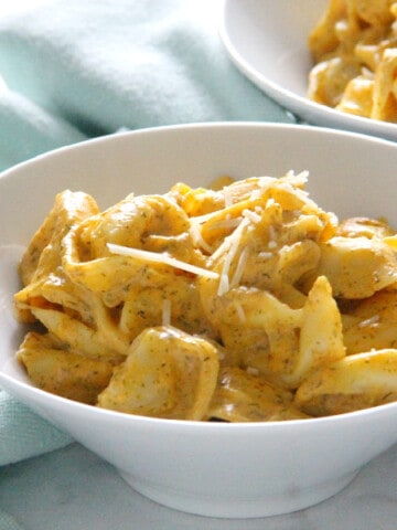 Creamy Pumpkin Tortellini in white bowl