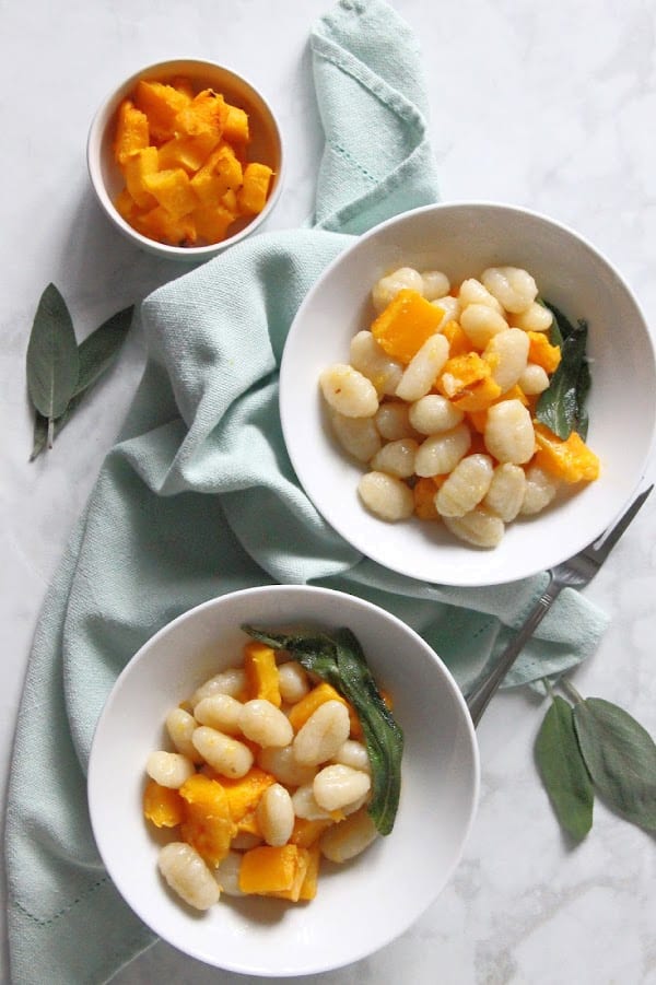 Pumpkin Gnocchi with Sage Butter Sauce in white bowl