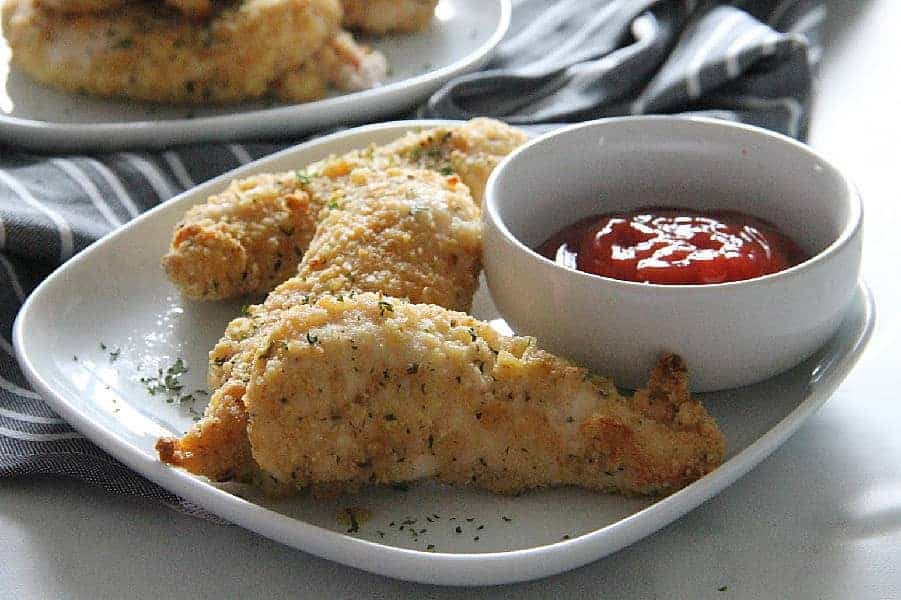 Easy Oven Baked Chicken Tenderloins on white plate