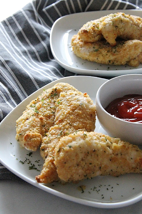 Easy Oven Baked Chicken Tenderloins on white plate