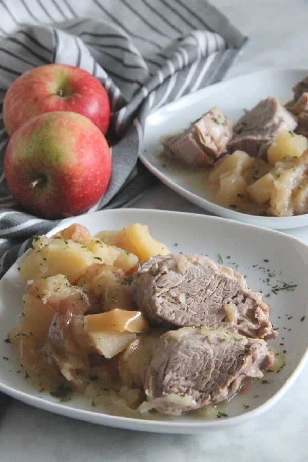 Instant Pot Pork Tenderloin with Apples and Onions on white plate
