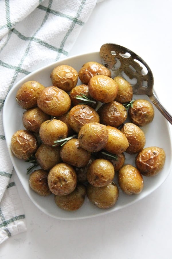 Spicy Roasted Rosemary Potatoes on white plate