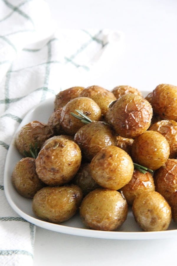 Spicy Roasted Rosemary Potatoes on white plate