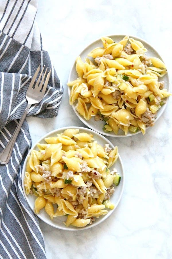 Spicy Sausage Zucchini Pasta on white background