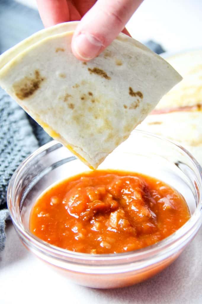 Ham and Cheese Quesadillas dipped in salsa