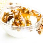 Butter Pecan Sauce in glass bowl over ice cream