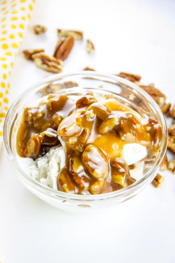 Butter Pecan Sauce in glass bowl with ice cream